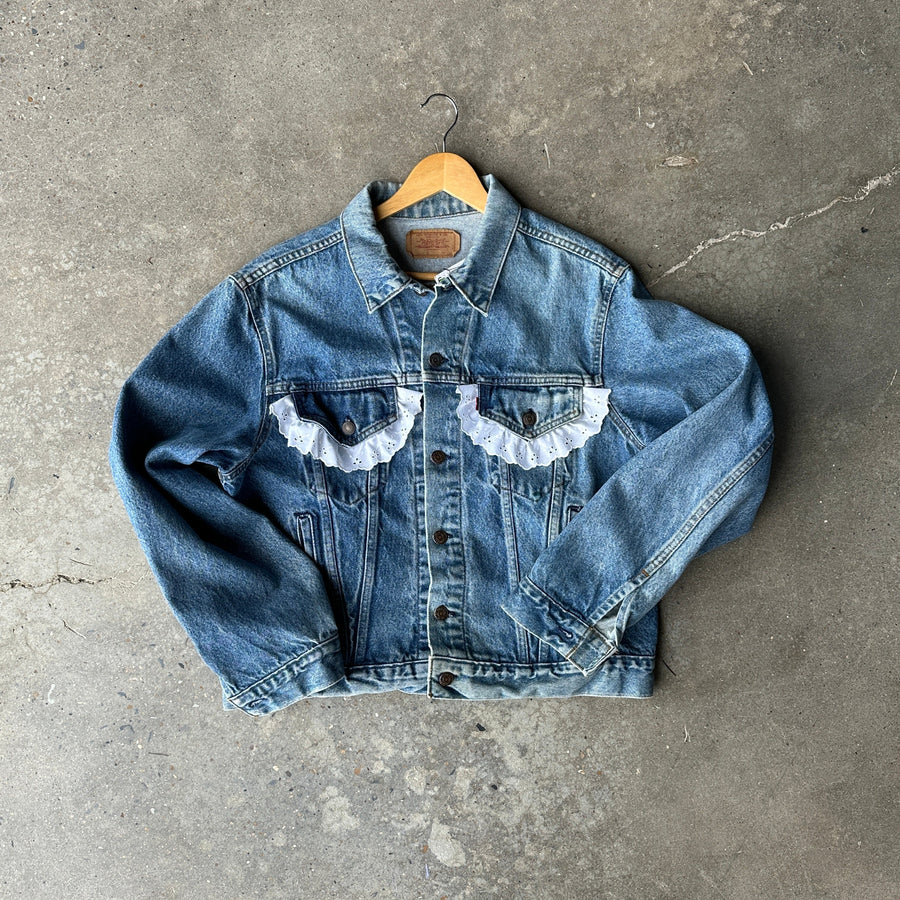 VTG Levi's denim jacket with lace pocket trim!