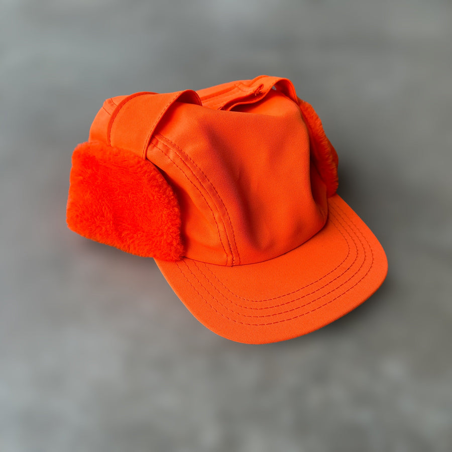 vintage orange thinsulate trapper hat with fuzzy ear flaps