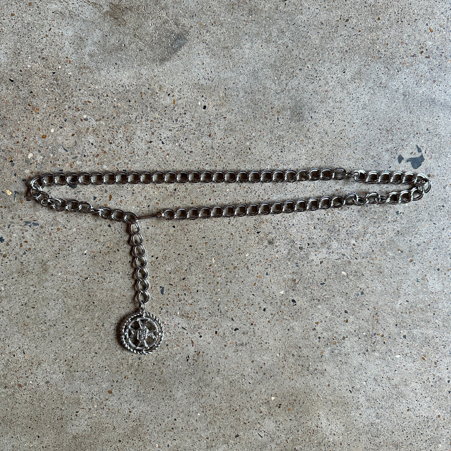 vintage silver chain belt with fleur-de-lis charm